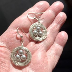 Exquisite birds nest earrings / silver wire/eggs